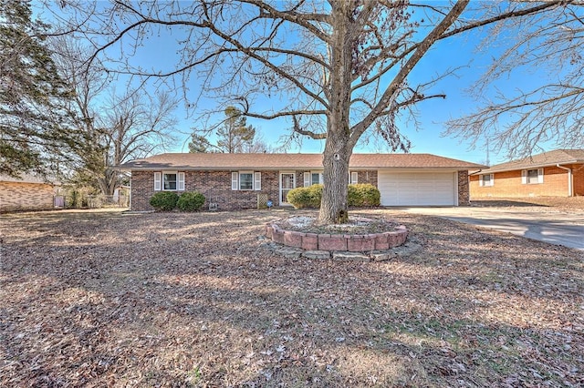 ranch-style home with a garage