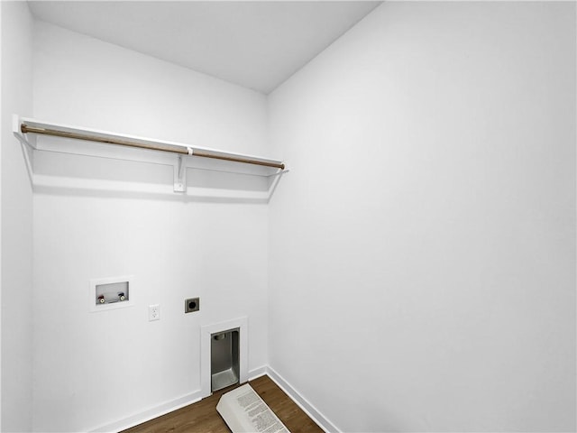 clothes washing area featuring dark wood-type flooring, baseboards, washer hookup, laundry area, and electric dryer hookup