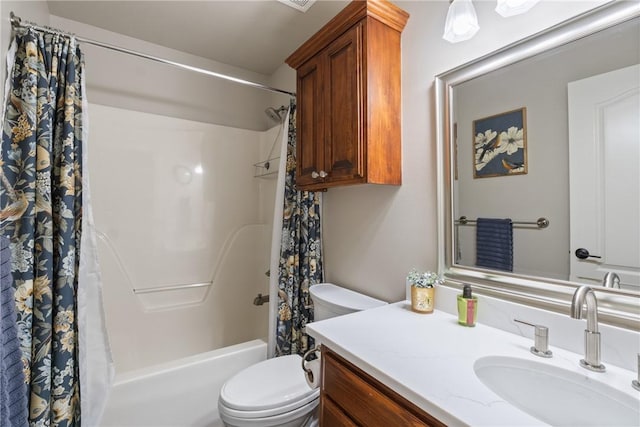 full bathroom featuring shower / tub combo, vanity, and toilet