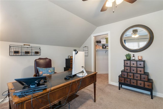 office area featuring vaulted ceiling, ceiling fan, and carpet flooring