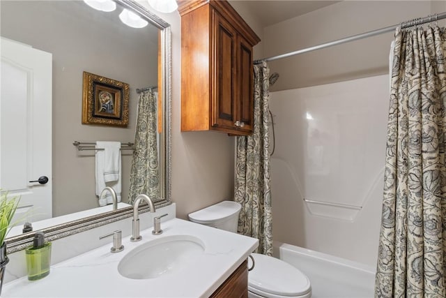 full bathroom with vanity, toilet, and shower / bath combo with shower curtain