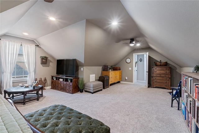 carpeted bedroom featuring ceiling fan and lofted ceiling