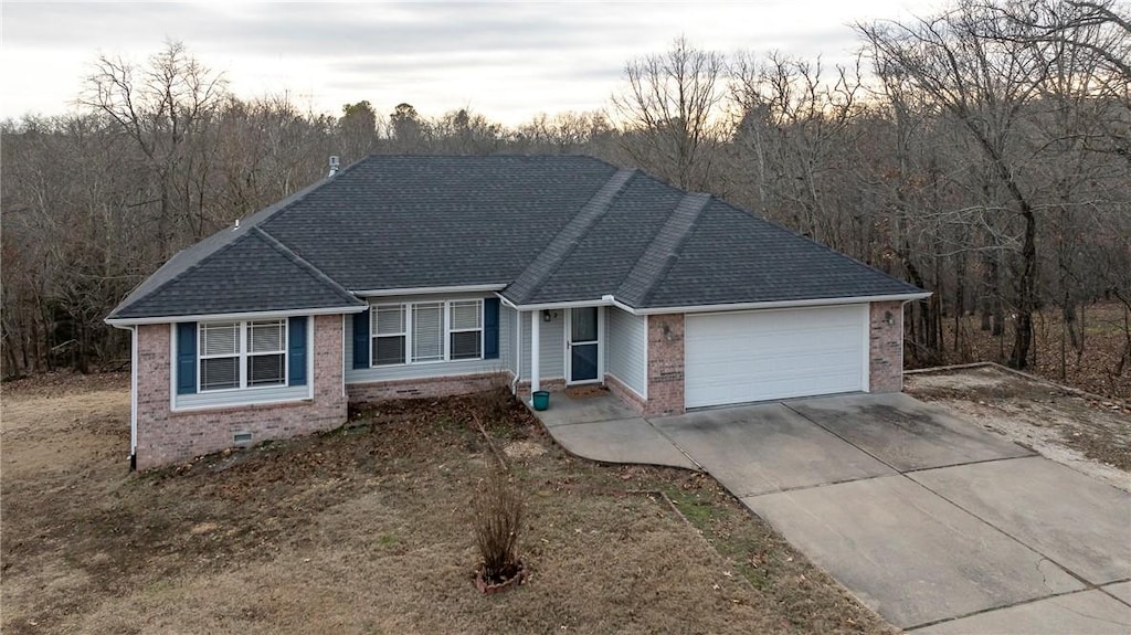 ranch-style home with a garage