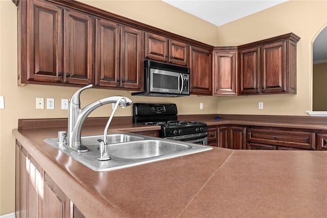 kitchen with sink and black range with gas stovetop