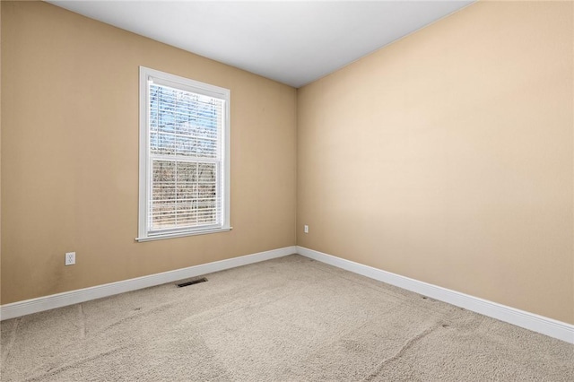 view of carpeted spare room