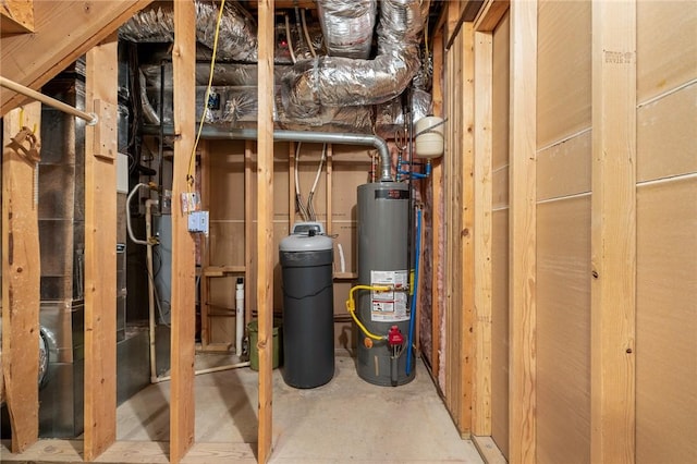 utility room featuring water heater