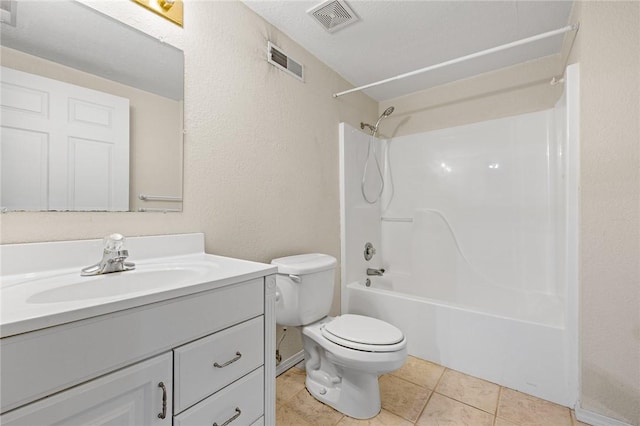 full bathroom with tile patterned floors, toilet, shower / bathing tub combination, and vanity