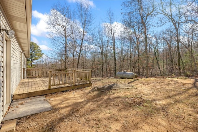 view of yard with a wooden deck