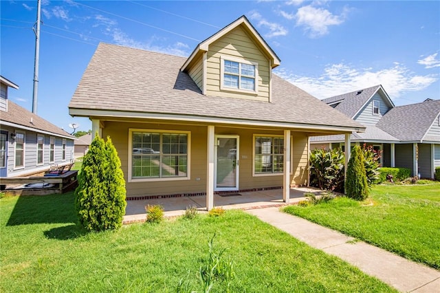 view of front of home featuring a front lawn