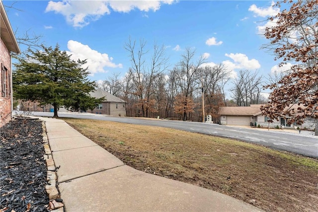 view of yard featuring a garage