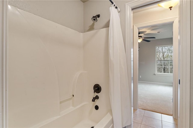 full bathroom with tile patterned flooring, shower / tub combo with curtain, ceiling fan, and baseboards