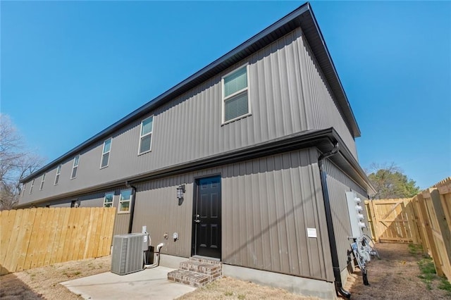 back of house featuring a patio and central AC