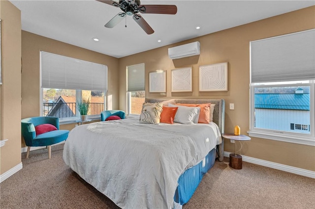 carpeted bedroom featuring an AC wall unit and ceiling fan