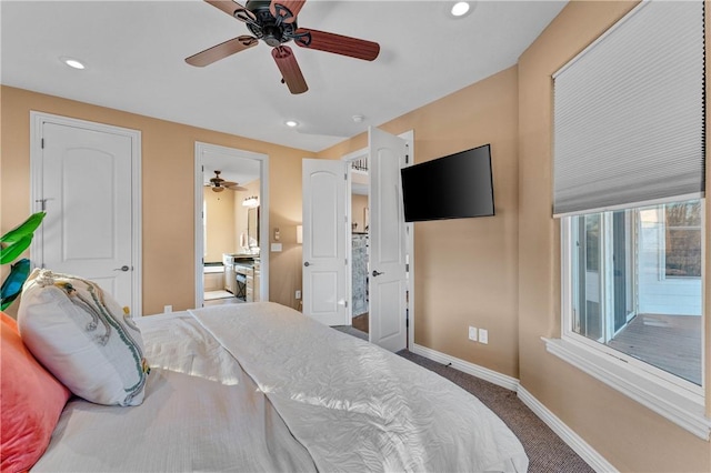 carpeted bedroom featuring ceiling fan