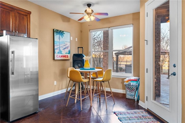 dining room featuring ceiling fan