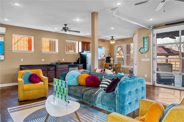 living room featuring sink and dark tile patterned flooring