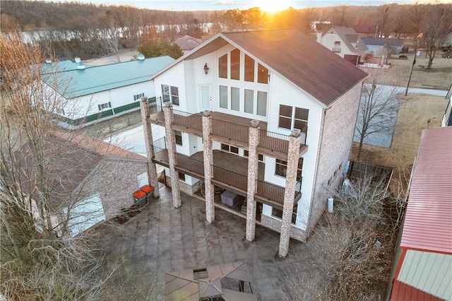 rear view of house with a balcony