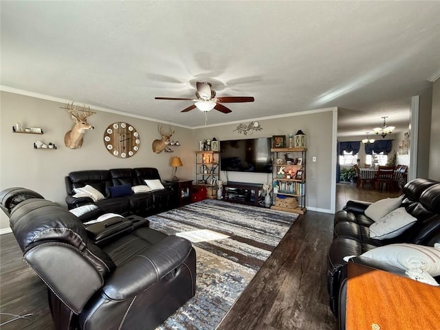 living room featuring dark hardwood / wood-style flooring, crown molding, and ceiling fan with notable chandelier