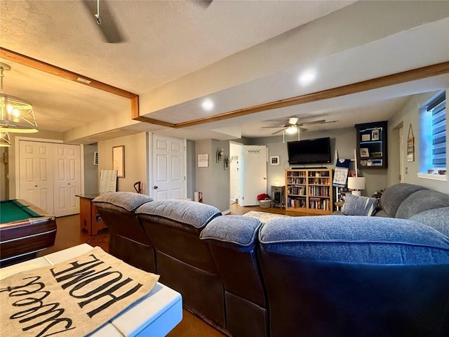 living room featuring billiards and ceiling fan