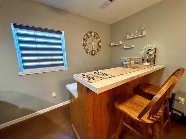 bar with tile countertops