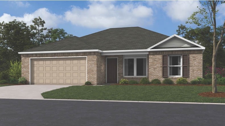 view of front facade with a garage and a front yard