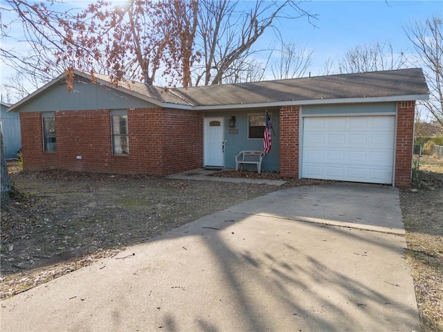 ranch-style house featuring a garage