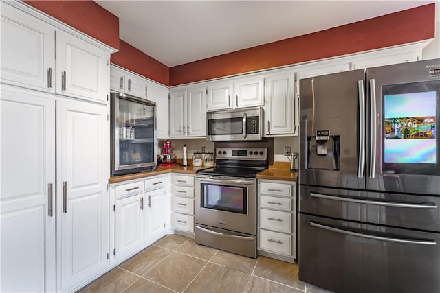 kitchen featuring white cabinets and stainless steel appliances