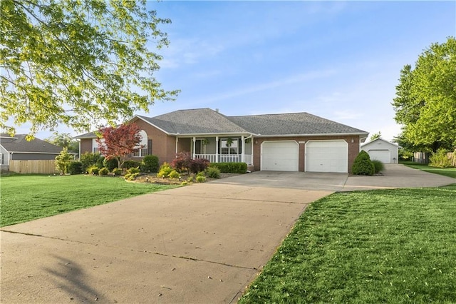 single story home with a front yard and a porch