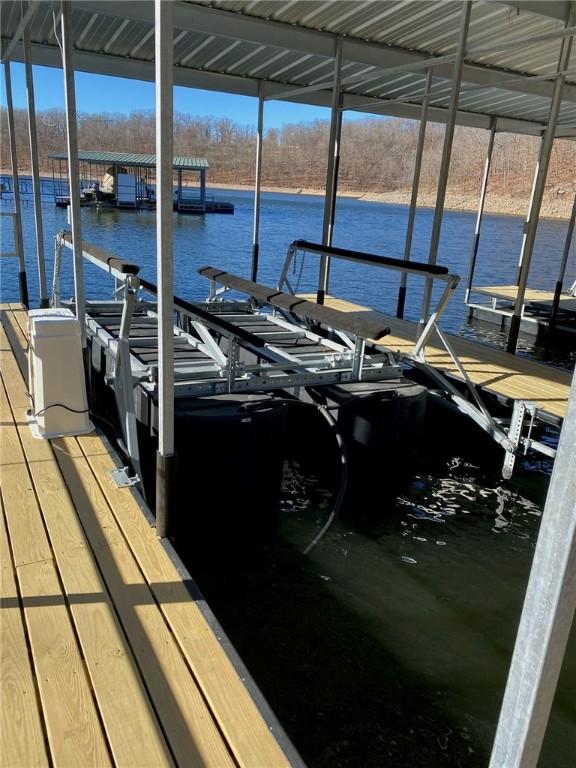 view of dock with a water view