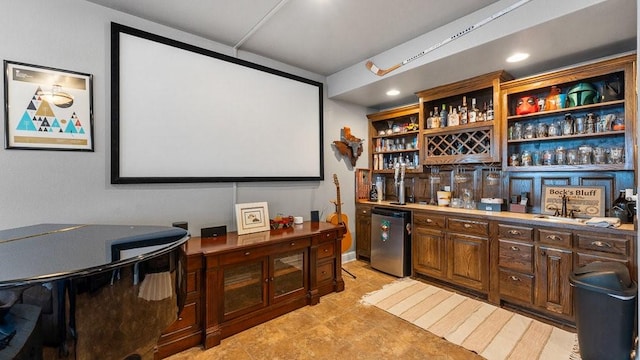 home theater room featuring wet bar