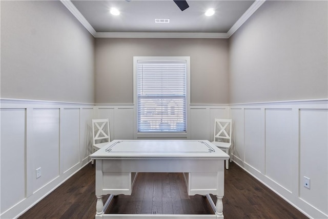 unfurnished office featuring crown molding and dark wood-type flooring