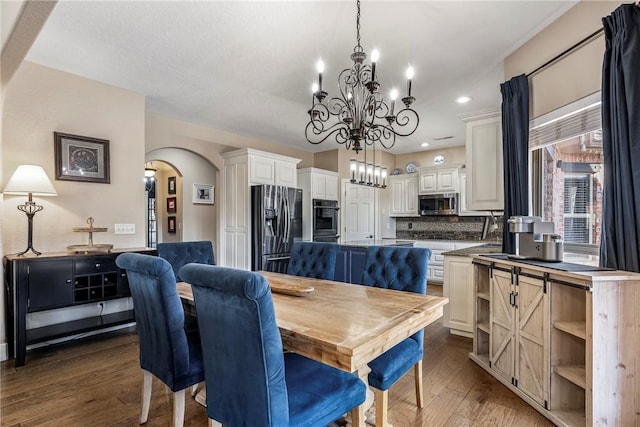 dining space featuring dark hardwood / wood-style flooring