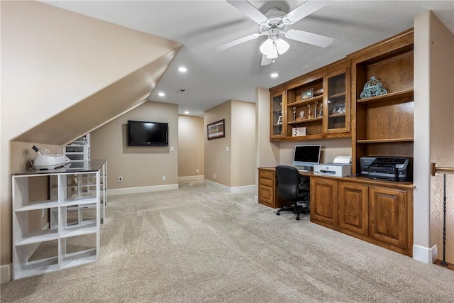 office space with light carpet, lofted ceiling, and ceiling fan