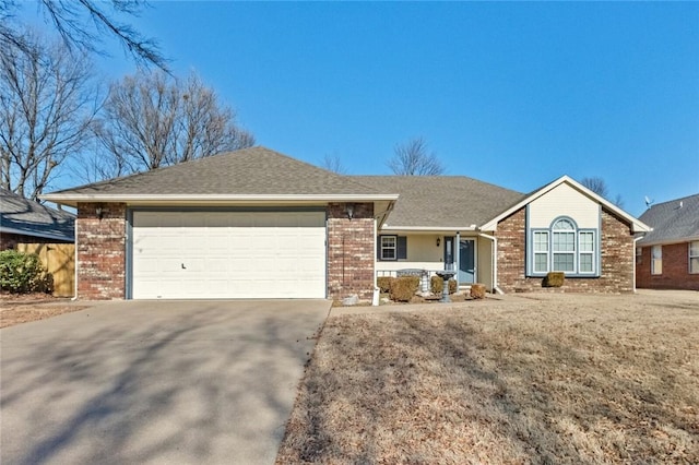 single story home with a garage and a front yard