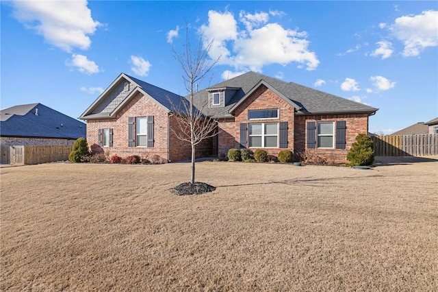 view of front of house with a front lawn