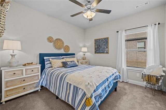 carpeted bedroom featuring ceiling fan