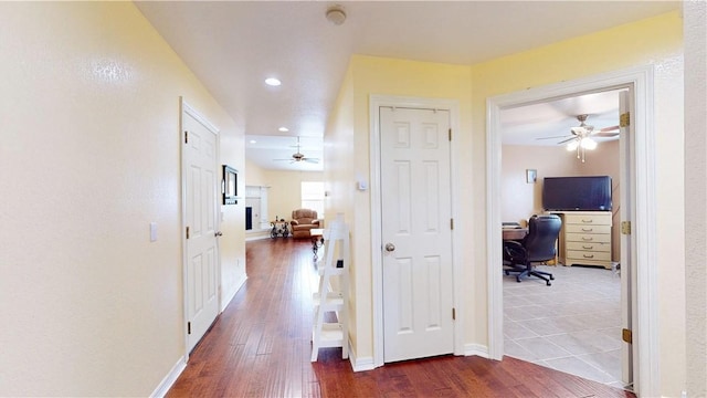 corridor featuring hardwood / wood-style floors