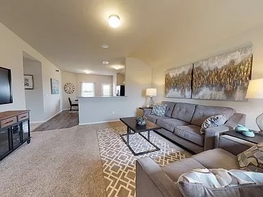 living room with carpet floors