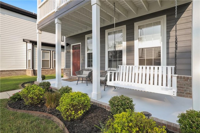 view of patio featuring a porch