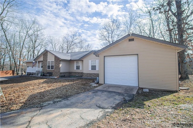 single story home featuring a garage