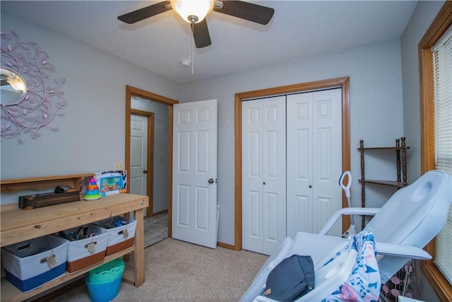 carpeted office with ceiling fan