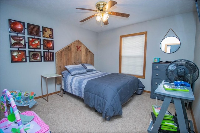 bedroom featuring ceiling fan and light carpet