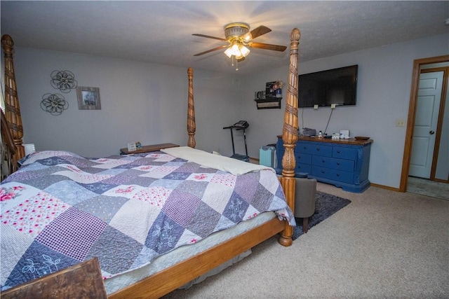 bedroom featuring ceiling fan and light carpet