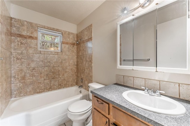 full bathroom with vanity, tiled shower / bath, backsplash, and toilet