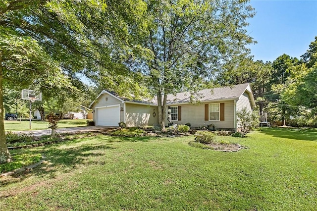 ranch-style house featuring a garage and a front yard