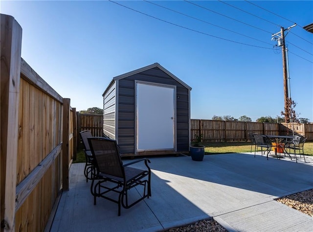 view of patio / terrace featuring a shed