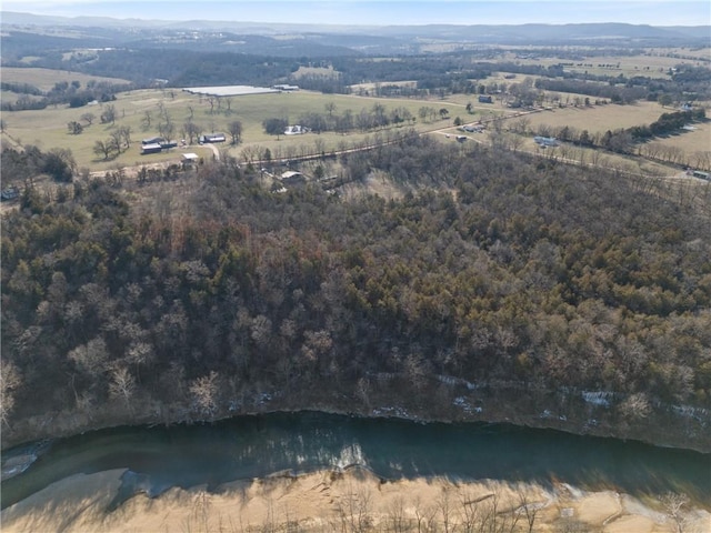 bird's eye view featuring a water view and a rural view