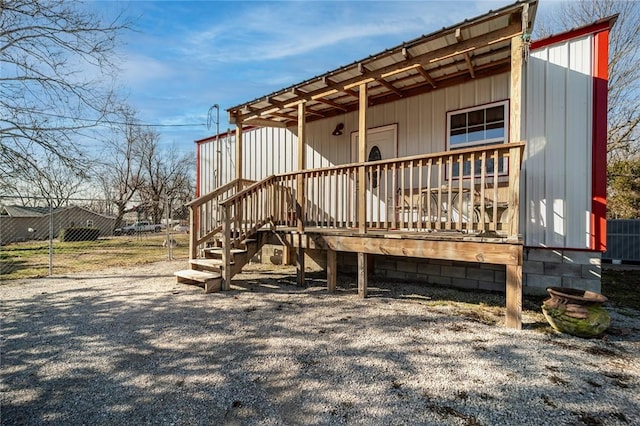 exterior space featuring a wooden deck