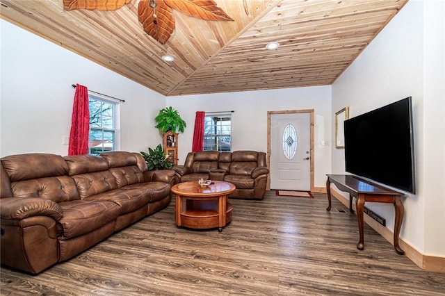 living room featuring ceiling fan, a healthy amount of sunlight, hardwood / wood-style floors, and wooden ceiling