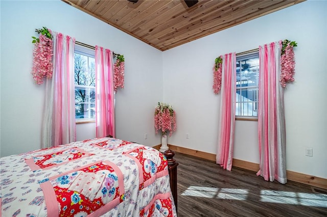 bedroom with wood ceiling and dark hardwood / wood-style floors